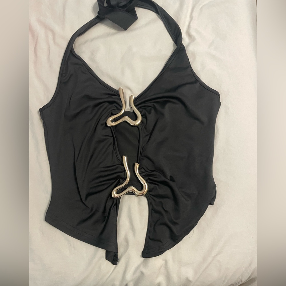 Black top with gold accents